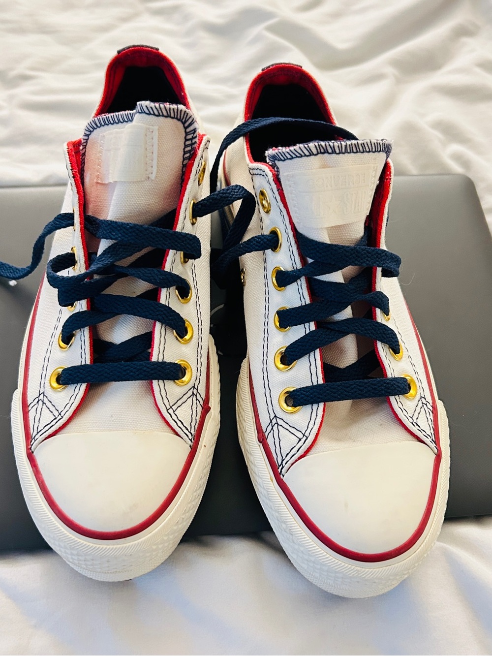 White Low-Top Canvas Sneakers with Navy Laces and Red Trim